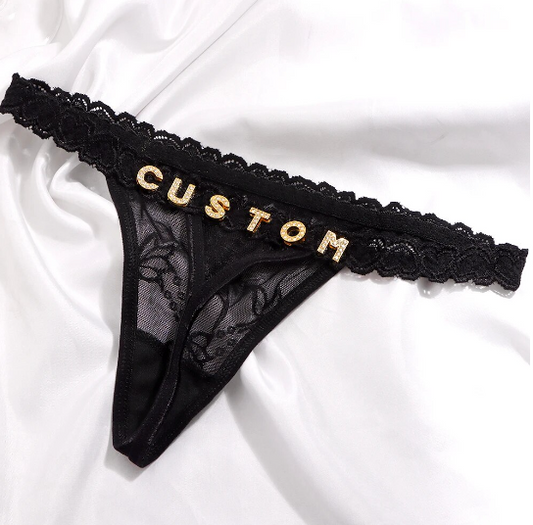 Elevate your lingerie collection with our Personalized Crystal Initials Lace Thong Panties for Women. These exquisite lace thong panties are not just underwear; they're a seductive work of art and a unique way to express yourself.