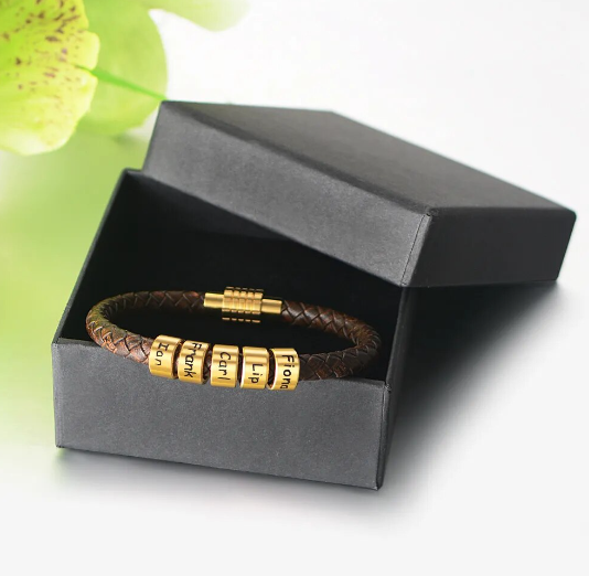 Introducing our Personalized Braided Leather Family Names Bracelet for Men – a truly unique and meaningful accessory that's perfect for celebrating the special men in your life. This exquisite bracelet features a stylish blend of braided leather and stainless steel beads, creating a sophisticated and timeless design.